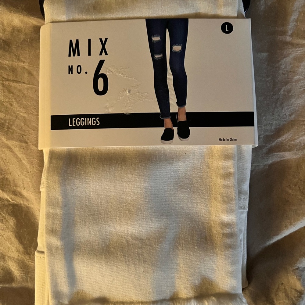 NWT white jean leggings size large, elastic waist band, frayed bottom